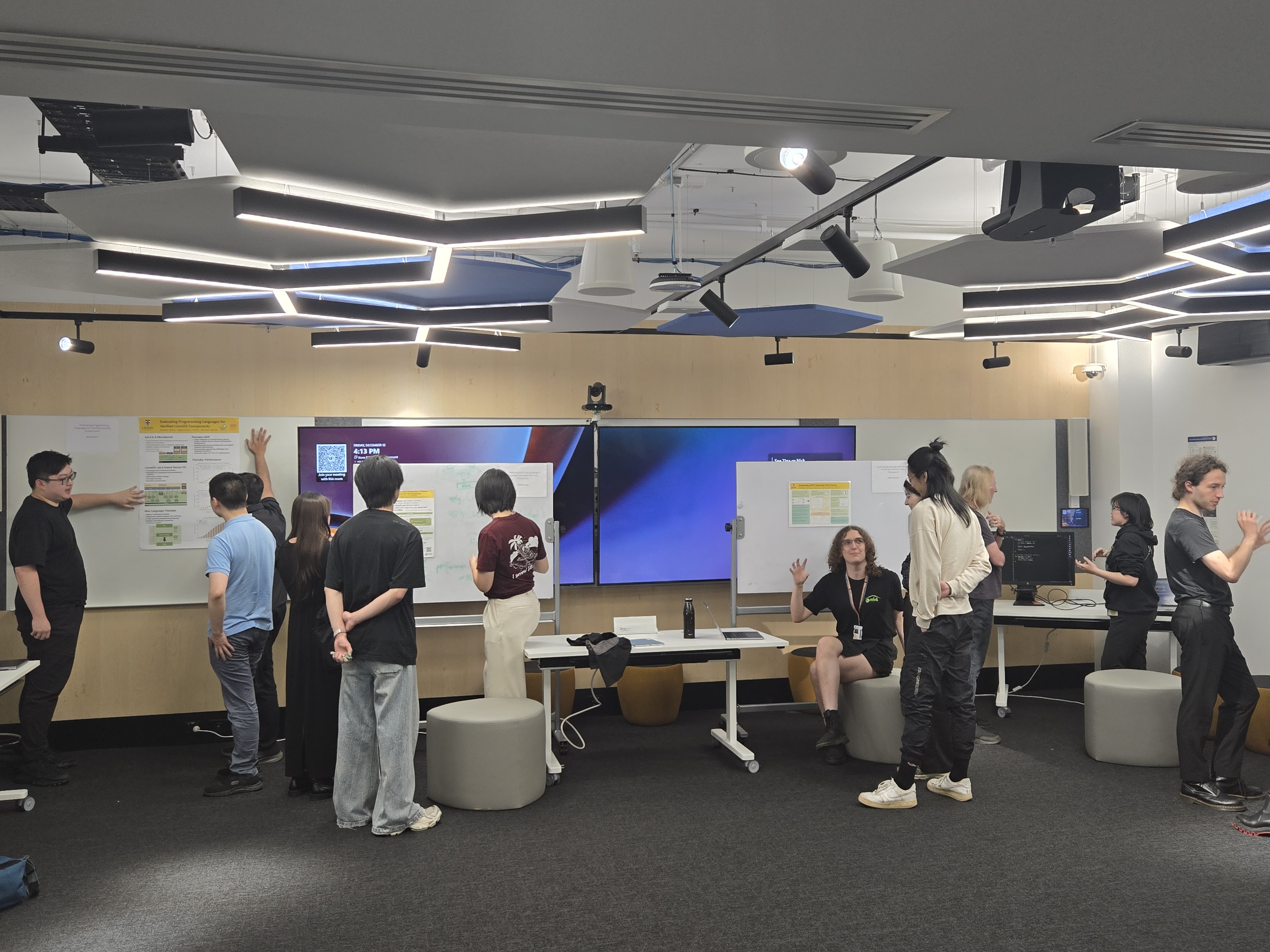 TS students presenting at thesis showcase