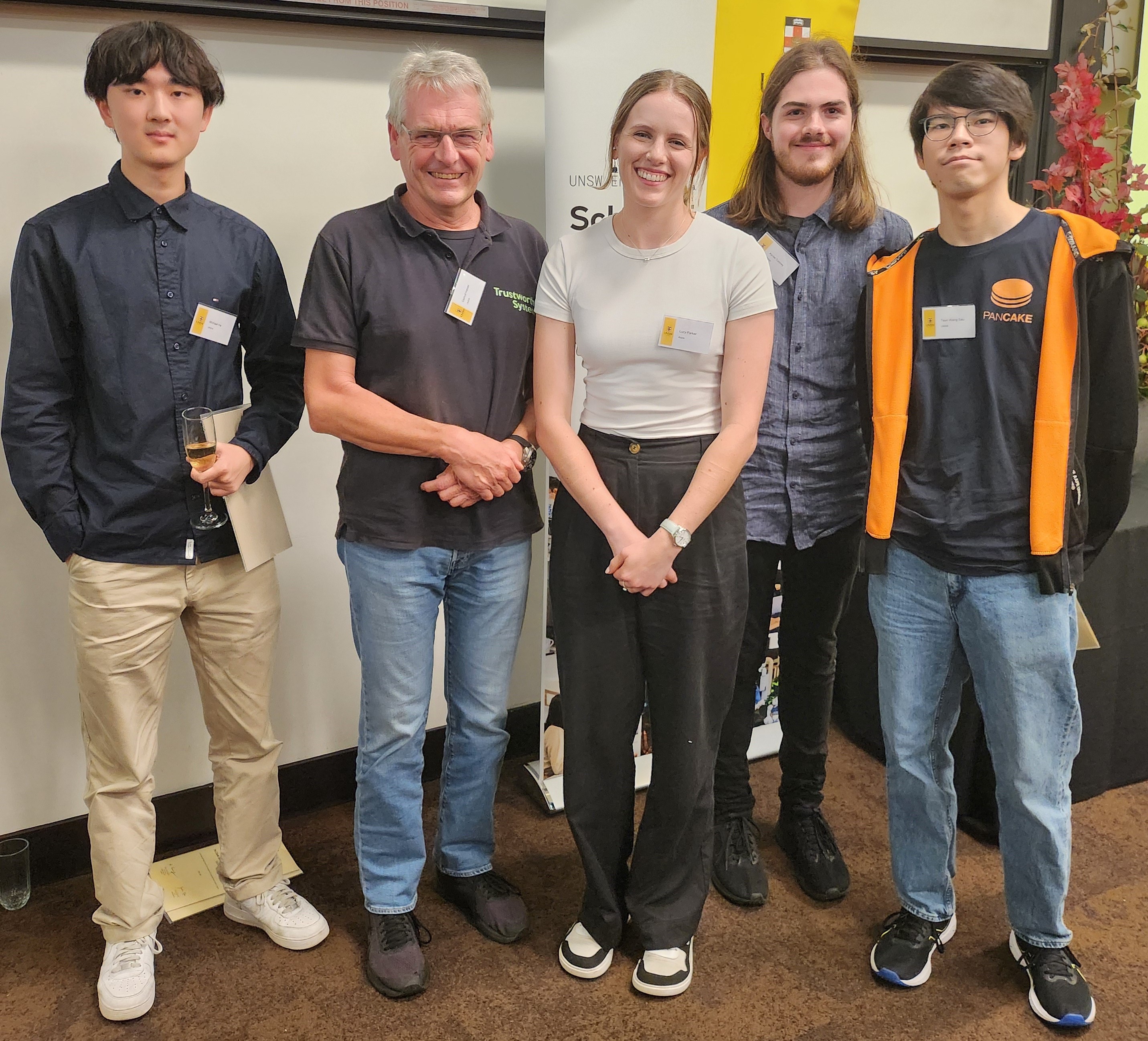 Left to right: Michael He, Gernot Heiser, Lucy Parker, Xavier Cooney, and Gordon Sau at the CSE Prize Night.